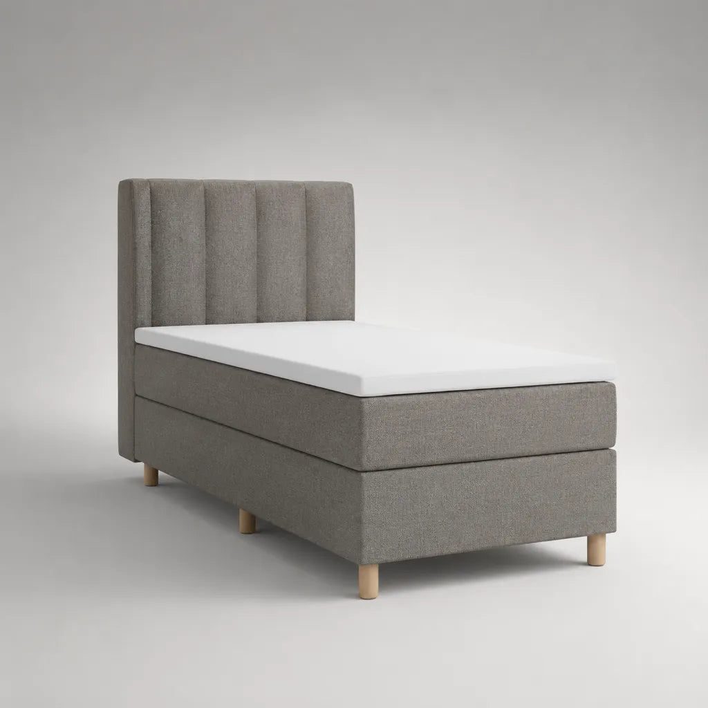 Lit boxspring une place en tissu gris clair avec tête de lit, matelas et surmatelas blanc, couchage 90 × 200 cm
